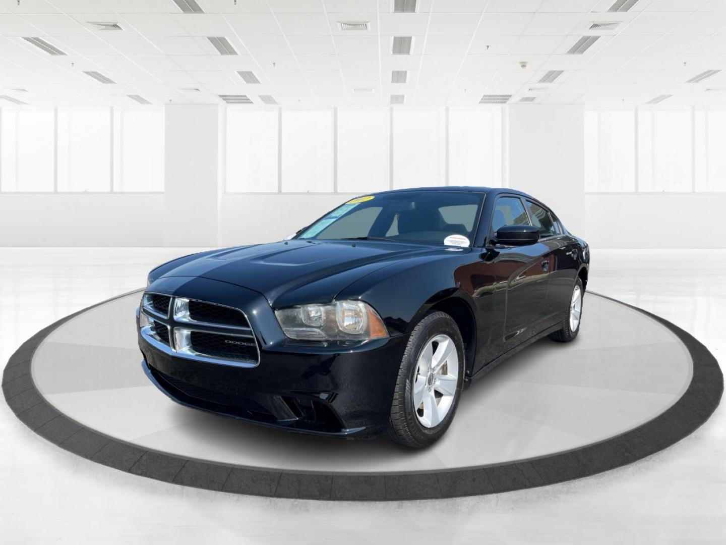 2012 Pitch Black Dodge Charger SE (2C3CDXBGXCH) with an 3.6L V6 DOHC 24V engine, 5-Speed Automatic transmission, located at 1951 S Dayton Lakeview Rd., New Carlisle, OH, 45344, (937) 908-9800, 39.890999, -84.050255 - Photo#7