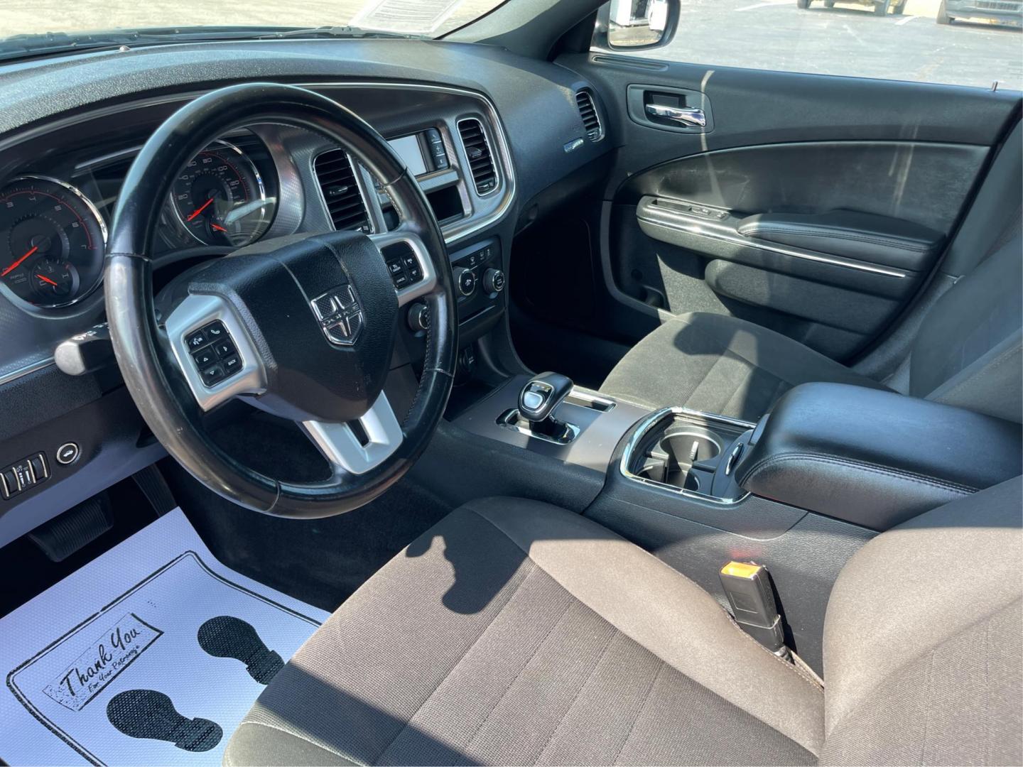 2012 Pitch Black Dodge Charger SE (2C3CDXBGXCH) with an 3.6L V6 DOHC 24V engine, 5-Speed Automatic transmission, located at 1951 S Dayton Lakeview Rd., New Carlisle, OH, 45344, (937) 908-9800, 39.890999, -84.050255 - Photo#8