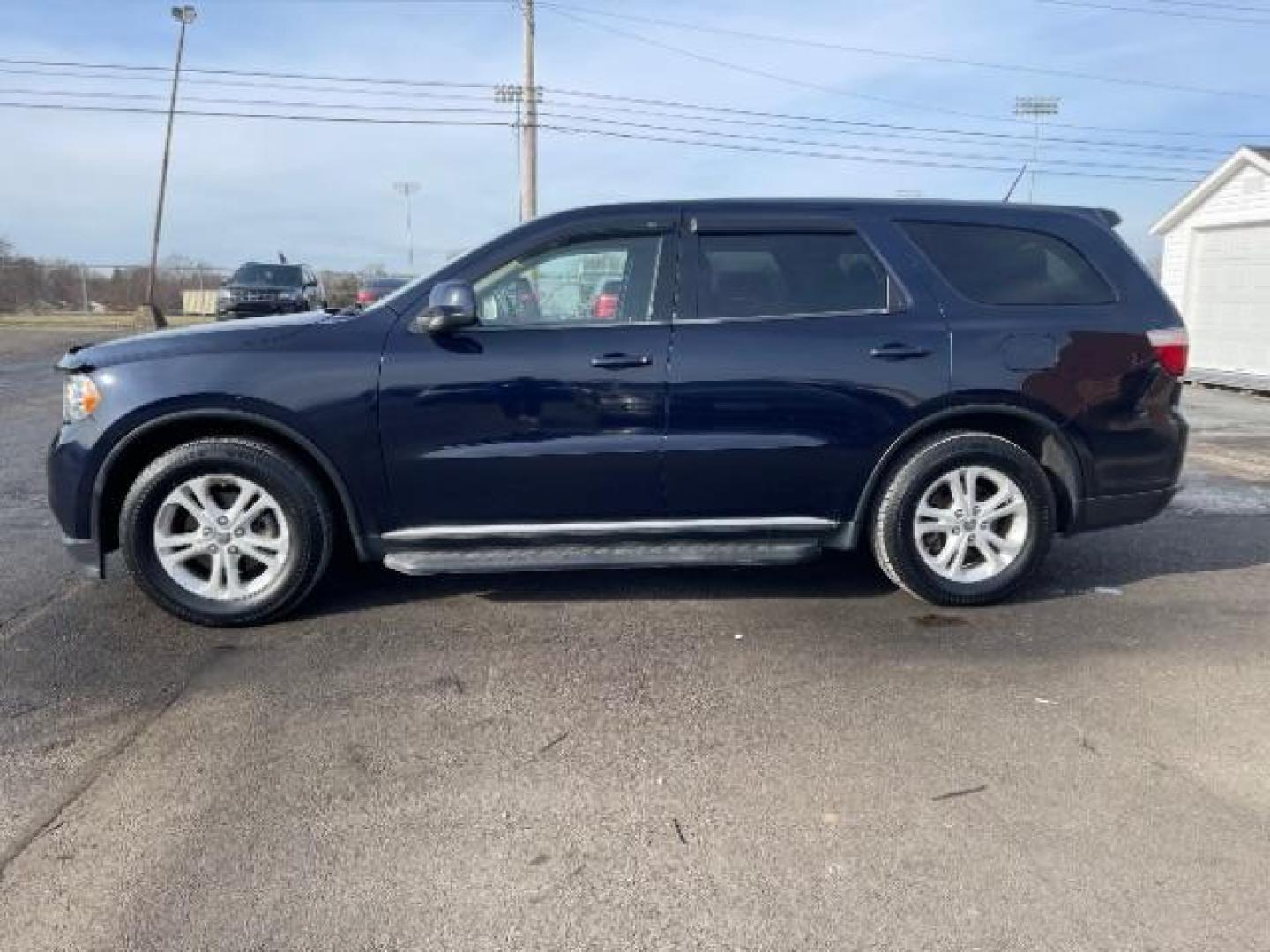 2012 True Blue Pearl Dodge Durango SXT AWD (1C4RDJAGXCC) with an 3.6L V6 DOHC 24V engine, 5-Speed Automatic transmission, located at 401 Woodman Dr, Riverside, OH, 45431, (937) 908-9800, 39.760899, -84.123421 - Photo#3