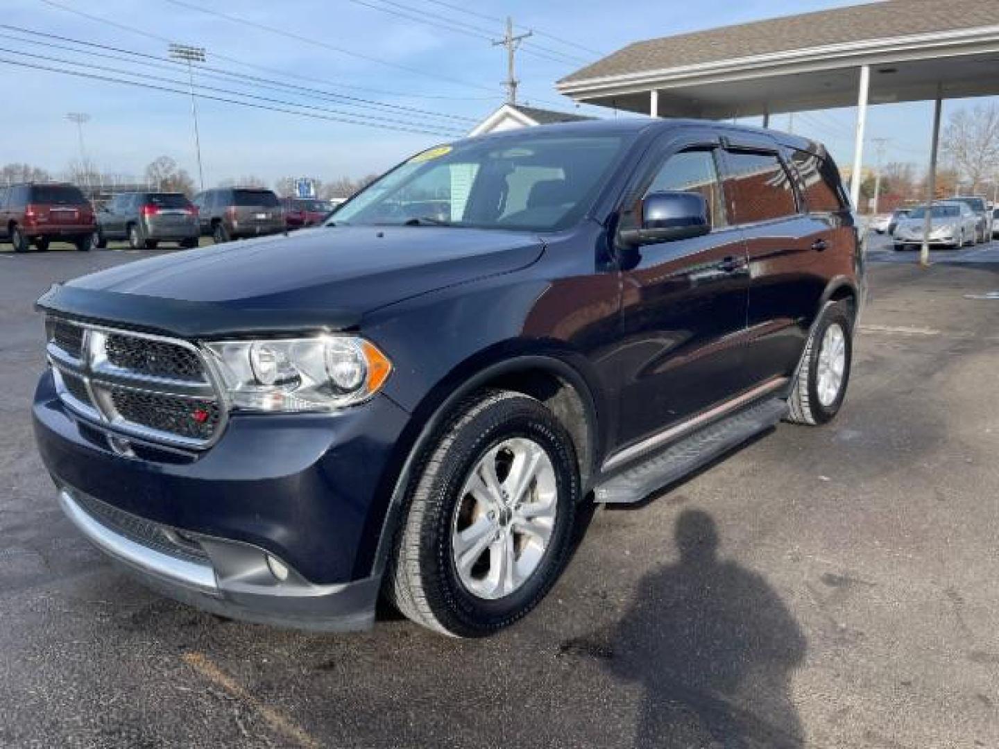 2012 True Blue Pearl Dodge Durango SXT AWD (1C4RDJAGXCC) with an 3.6L V6 DOHC 24V engine, 5-Speed Automatic transmission, located at 401 Woodman Dr, Riverside, OH, 45431, (937) 908-9800, 39.760899, -84.123421 - Photo#4