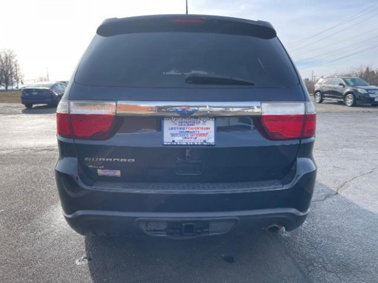 2012 True Blue Pearl Dodge Durango SXT AWD (1C4RDJAGXCC) with an 3.6L V6 DOHC 24V engine, 5-Speed Automatic transmission, located at 401 Woodman Dr, Riverside, OH, 45431, (937) 908-9800, 39.760899, -84.123421 - Photo#5