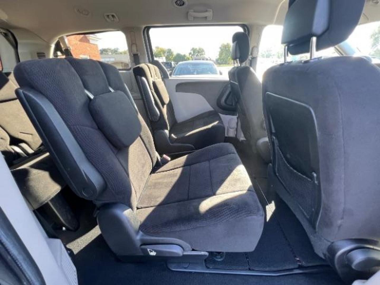 2012 Bright Silver Metallic Dodge Grand Caravan SXT (2C4RDGCG8CR) with an 3.6L V6 DOHC 24V engine, 6-Speed Automatic transmission, located at 880 E. National Road, Vandalia, OH, 45377, (937) 908-9800, 39.891918, -84.183594 - Photo#9