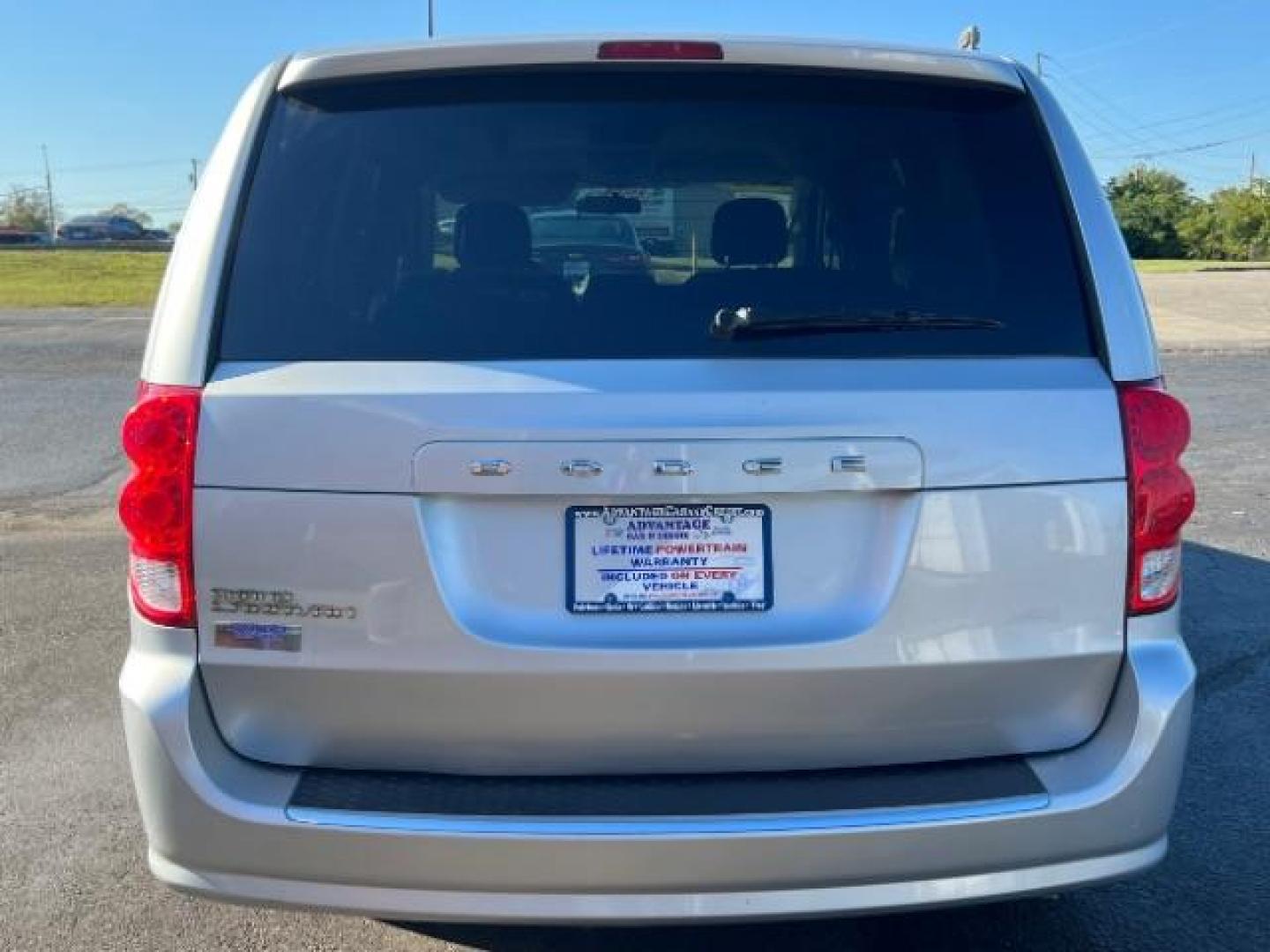 2012 Bright Silver Metallic Dodge Grand Caravan SXT (2C4RDGCG8CR) with an 3.6L V6 DOHC 24V engine, 6-Speed Automatic transmission, located at 880 E. National Road, Vandalia, OH, 45377, (937) 908-9800, 39.891918, -84.183594 - Photo#4