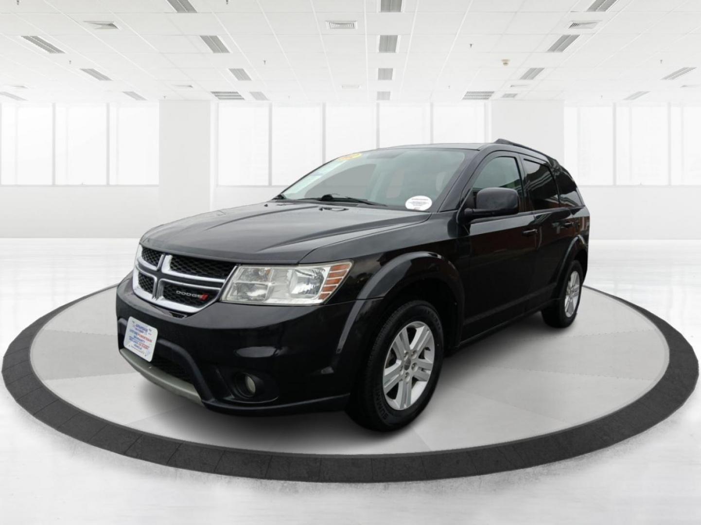 2012 Brilliant Black Crystal Pearl Dodge Journey SXT (3C4PDCBB6CT) with an 2.4L L6 DOHC 16V engine, 4-Speed Automatic transmission, located at 8750 N County Rd 25A, Piqua, OH, 45356, (937) 908-9800, 40.164391, -84.232513 - Photo#7