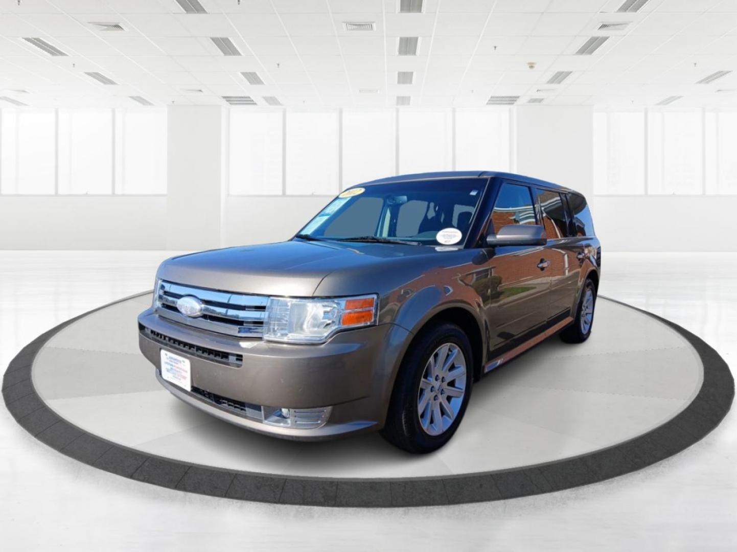 2012 Mineral Gray Metallic Ford Flex SEL FWD (2FMGK5CC2CB) with an 3.5L V6 DOHC 24V engine, 6-Speed Automatic Overdrive transmission, located at 1184 Kauffman Ave, Fairborn, OH, 45324, (937) 908-9800, 39.807072, -84.030914 - Photo#7