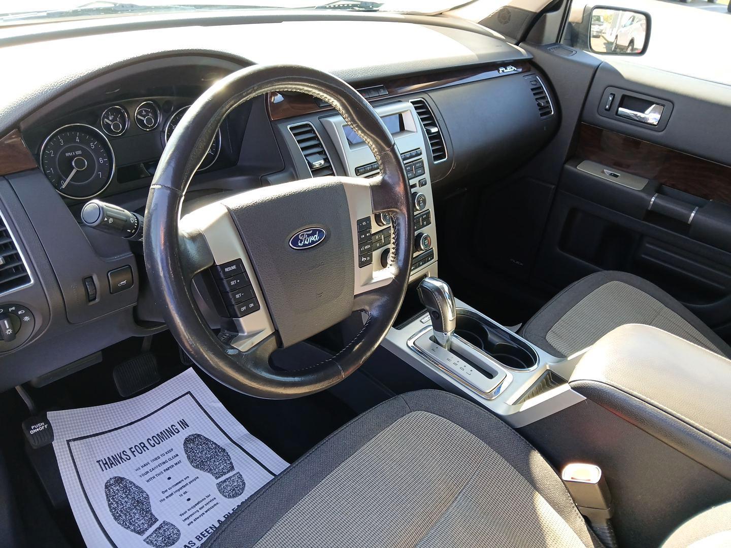 2012 Mineral Gray Metallic Ford Flex SEL FWD (2FMGK5CC2CB) with an 3.5L V6 DOHC 24V engine, 6-Speed Automatic Overdrive transmission, located at 1184 Kauffman Ave, Fairborn, OH, 45324, (937) 908-9800, 39.807072, -84.030914 - Photo#8