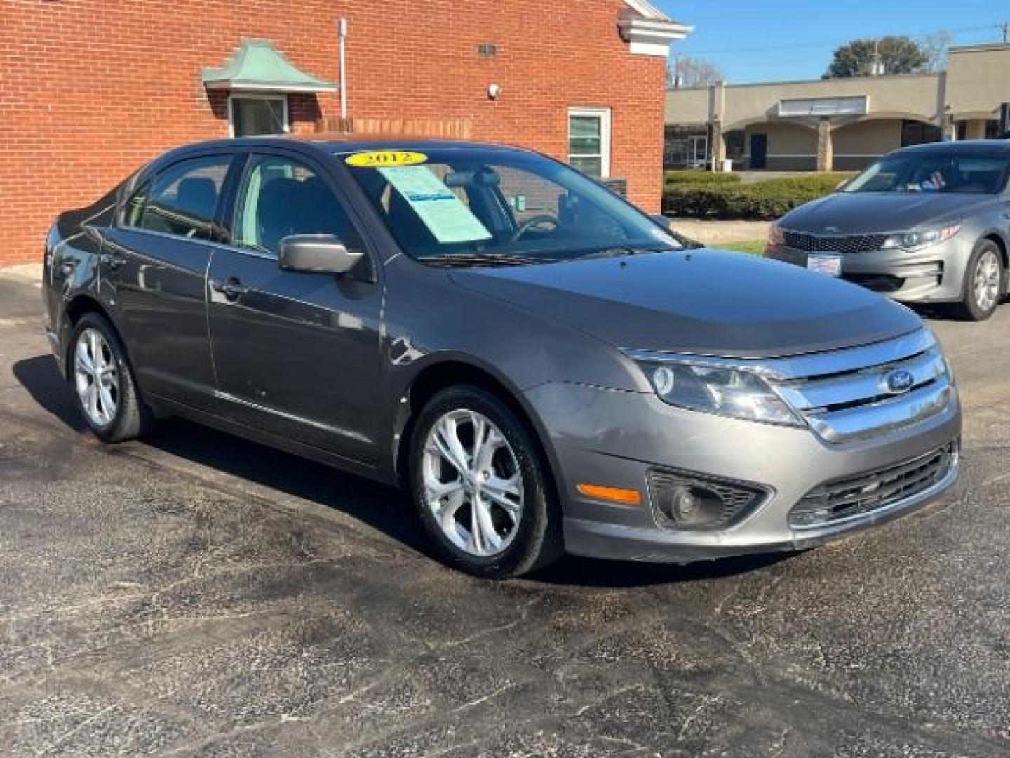 2012 Sterling Gray Metallic Ford Fusion SE (3FAHP0HA5CR) with an 2.5L L4 DOHC 16V engine, located at 4508 South Dixie Dr, Moraine, OH, 45439, (937) 908-9800, 39.689976, -84.218452 - Photo#0