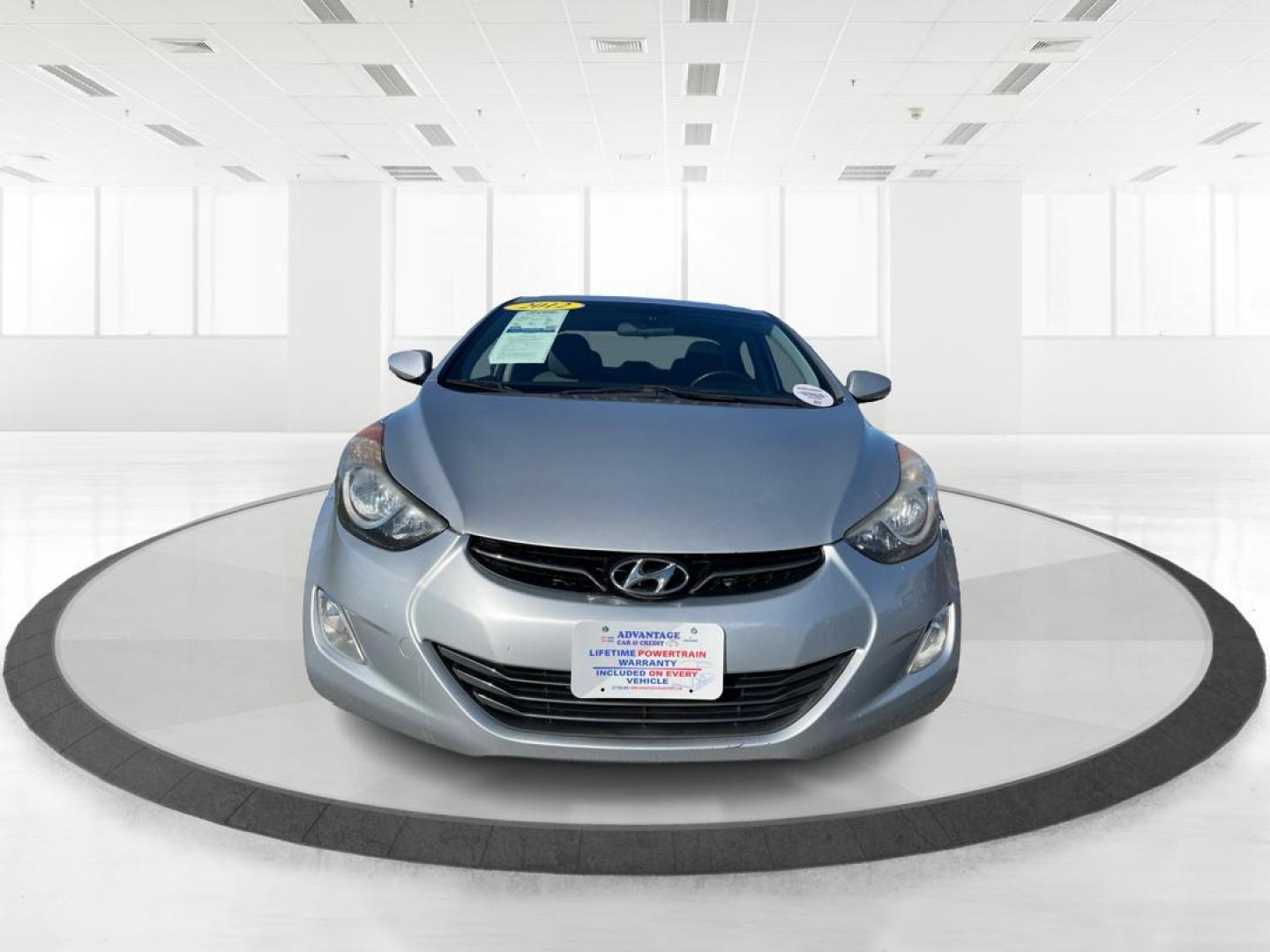 2012 Radiant Silver Metallic Hyundai Elantra Limited (5NPDH4AEXCH) with an 1.8L L4 DOHC 16V engine, 6-Speed Automatic transmission, located at 401 Woodman Dr, Riverside, OH, 45431, (937) 908-9800, 39.760899, -84.123421 - Photo#6