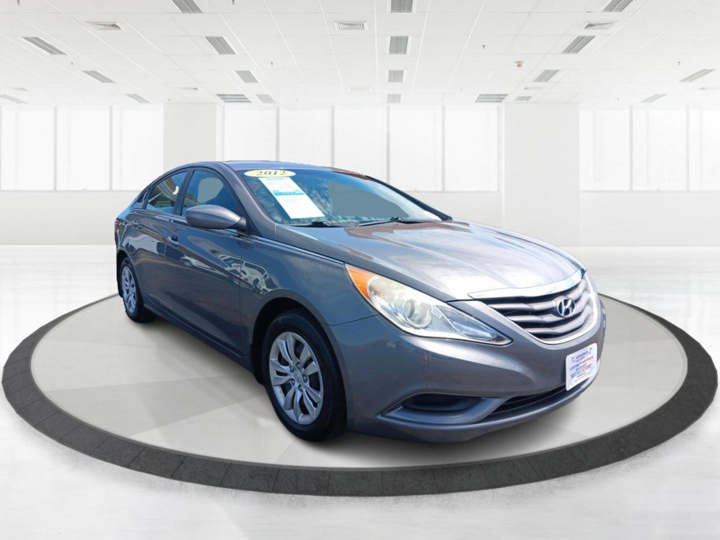 2012 Harbor Gray Metallic Hyundai Sonata (5NPEB4AC3CH) with an 2.4L L4 DOHC 16V engine, 6-Speed Automatic transmission, located at 1099 N County Rd 25A , Troy, OH, 45373, (937) 908-9800, 40.057079, -84.212883 - Photo#0