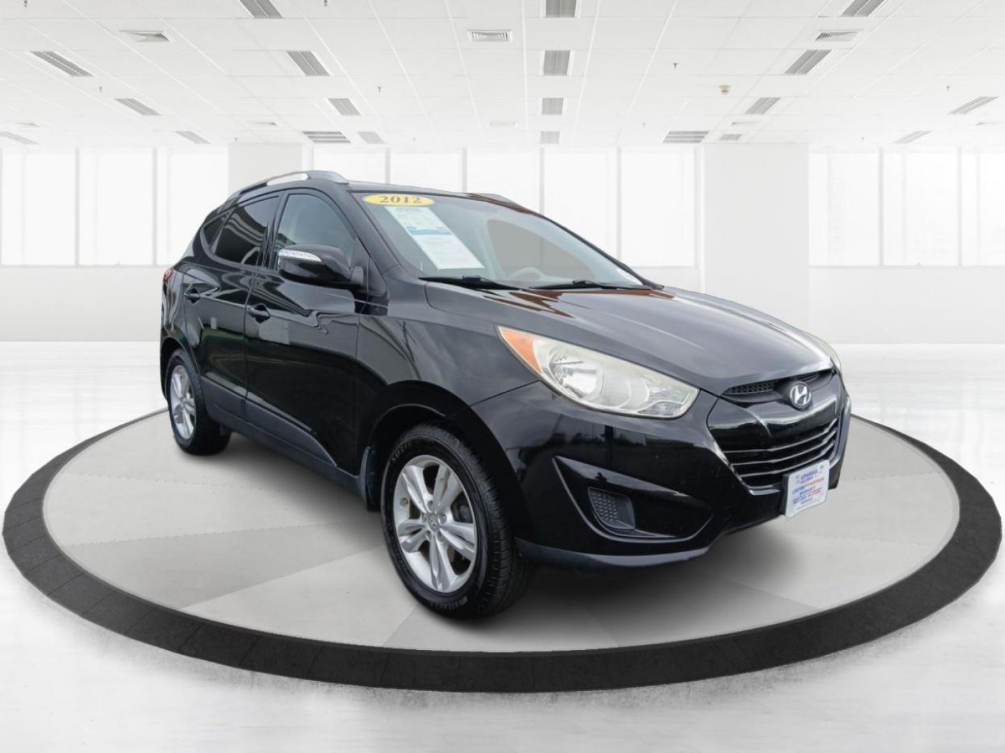 2012 Hyundai Tucson GLS AWD (KM8JUCACXCU) with an 2.4L L4 DOHC 16V engine, 6-Speed Automatic transmission, located at 1099 N County Rd 25A , Troy, OH, 45373, (937) 908-9800, 40.057079, -84.212883 - 2012 Hyundai Tucson GLS AWD - Photo#0