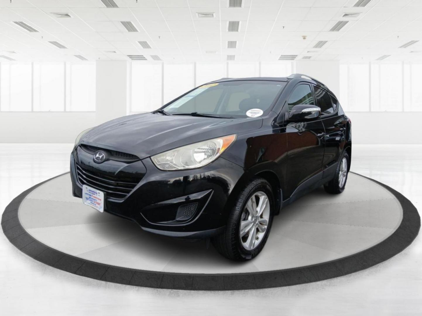 2012 Hyundai Tucson GLS AWD (KM8JUCACXCU) with an 2.4L L4 DOHC 16V engine, 6-Speed Automatic transmission, located at 1099 N County Rd 25A , Troy, OH, 45373, (937) 908-9800, 40.057079, -84.212883 - 2012 Hyundai Tucson GLS AWD - Photo#7