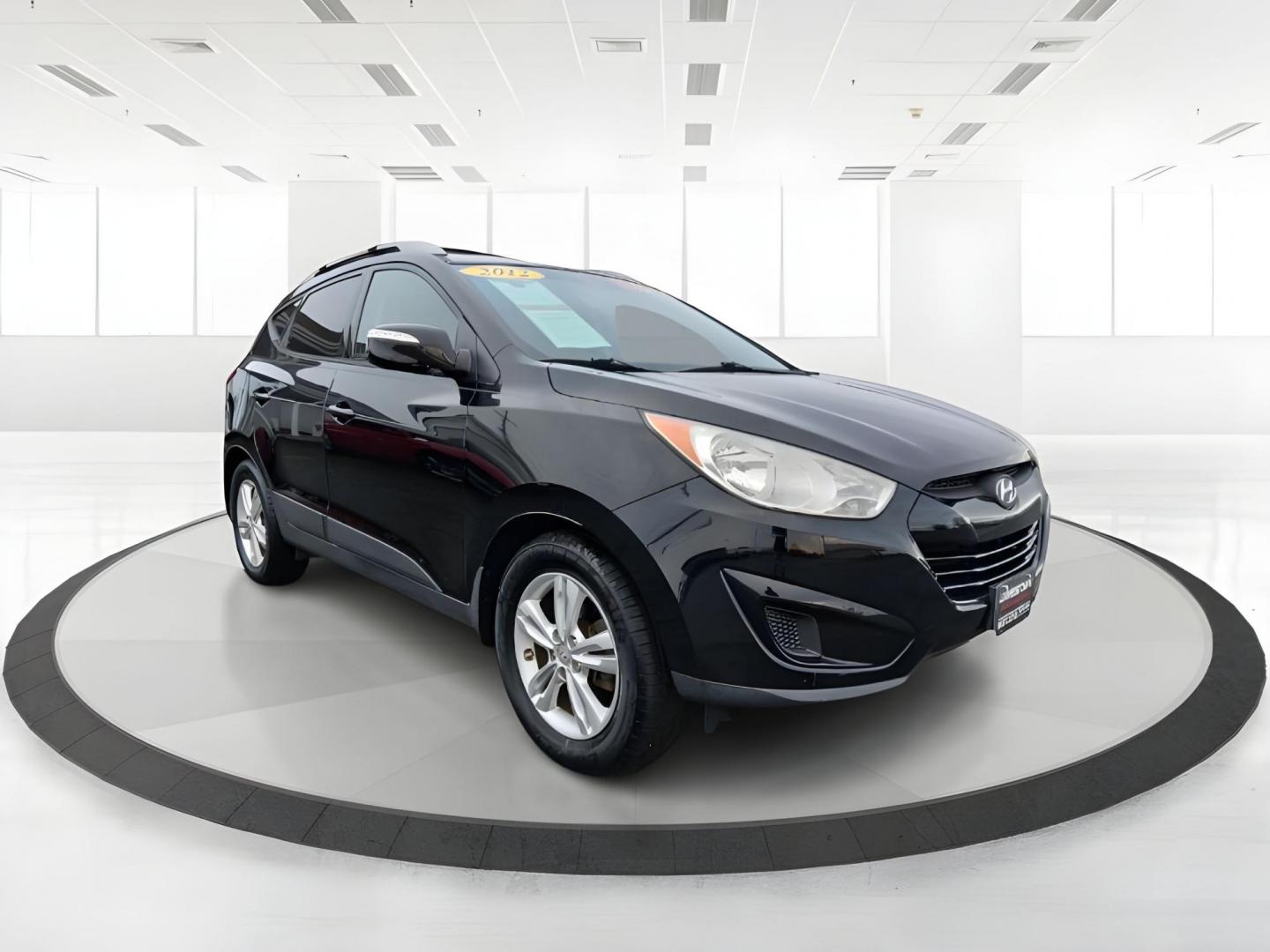 2012 Hyundai Tucson GLS AWD (KM8JUCACXCU) with an 2.4L L4 DOHC 16V engine, 6-Speed Automatic transmission, located at 1951 S Dayton Lakeview Rd., New Carlisle, OH, 45344, (937) 908-9800, 39.890999, -84.050255 - 2012 Hyundai Tucson GLS AWD - Photo#0