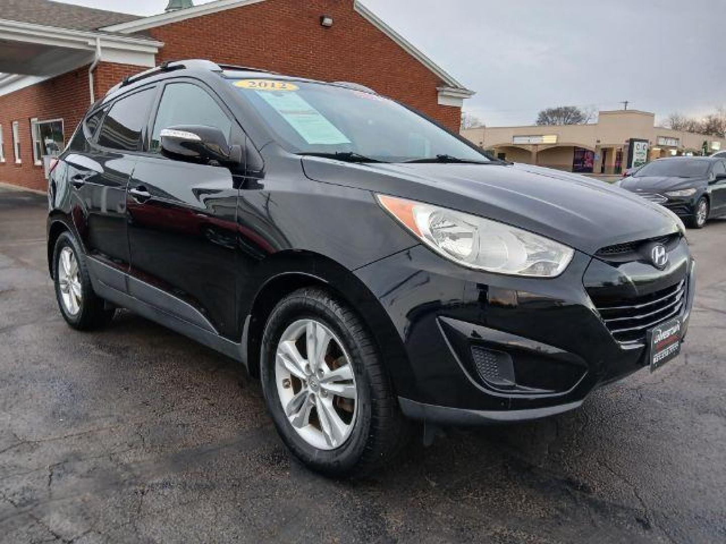 2012 Hyundai Tucson GLS AWD (KM8JUCACXCU) with an 2.4L L4 DOHC 16V engine, 6-Speed Automatic transmission, located at 1951 S Dayton Lakeview Rd., New Carlisle, OH, 45344, (937) 908-9800, 39.890999, -84.050255 - 2012 Hyundai Tucson GLS AWD - Photo#13