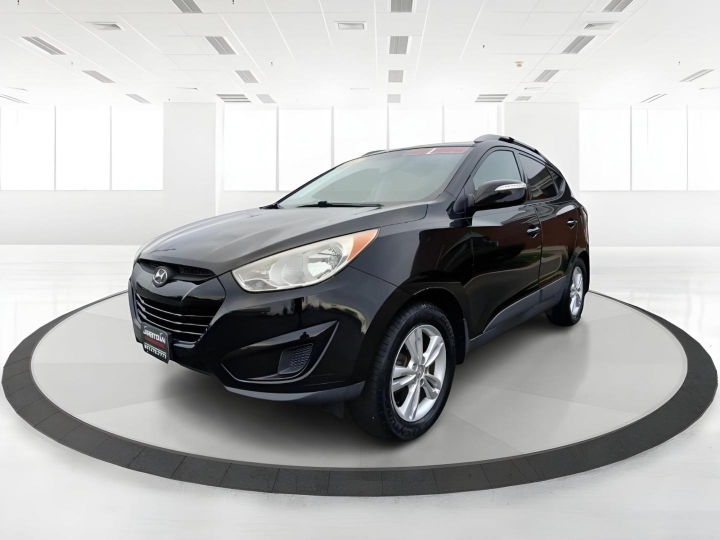 2012 Hyundai Tucson GLS AWD (KM8JUCACXCU) with an 2.4L L4 DOHC 16V engine, 6-Speed Automatic transmission, located at 1951 S Dayton Lakeview Rd., New Carlisle, OH, 45344, (937) 908-9800, 39.890999, -84.050255 - 2012 Hyundai Tucson GLS AWD - Photo#5