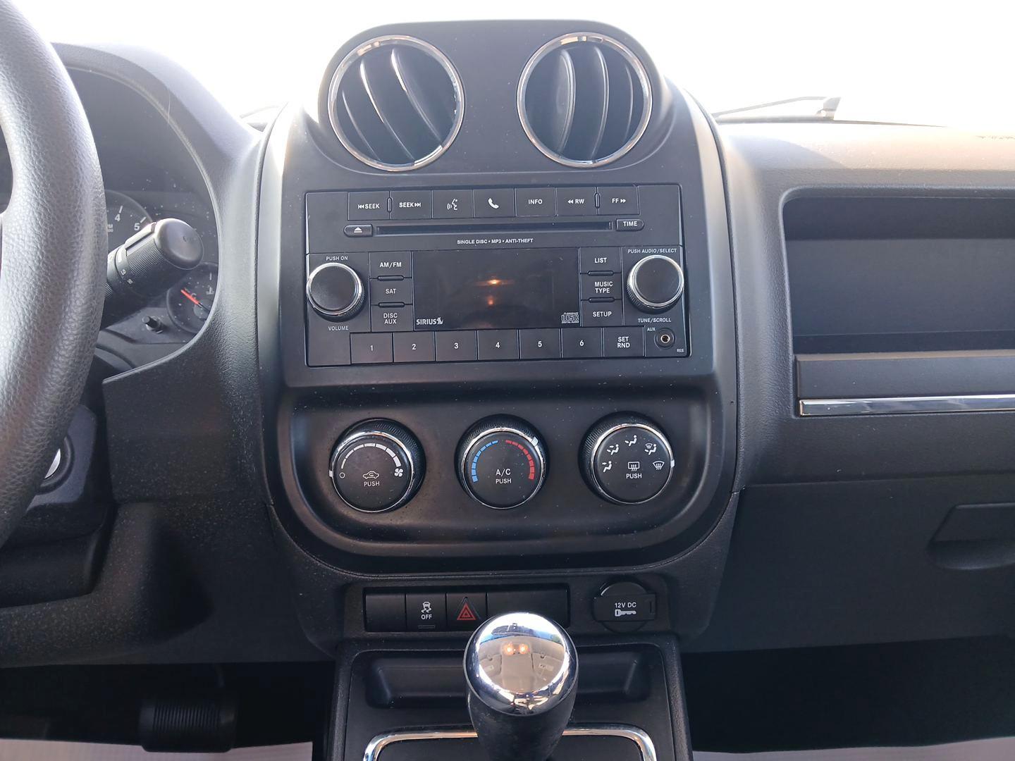 2012 Mineral Gray Metallic Jeep Compass Sport 4WD (1C4NJDBB6CD) with an 2.4L L4 DOHC 16V engine, located at 1951 S Dayton Lakeview Rd., New Carlisle, OH, 45344, (937) 908-9800, 39.890999, -84.050255 - Photo#12