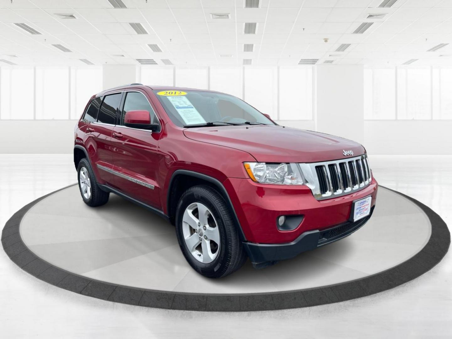 2012 Deep Cherry Red Crystal Pearl Jeep Grand Cherokee Laredo 4WD (1C4RJFAG6CC) with an 3.6L V6 DOHC 24V engine, 5-Speed Automatic transmission, located at 1230 East Main St, Xenia, OH, 45385, (937) 908-9800, 39.688026, -83.910172 - Photo#0