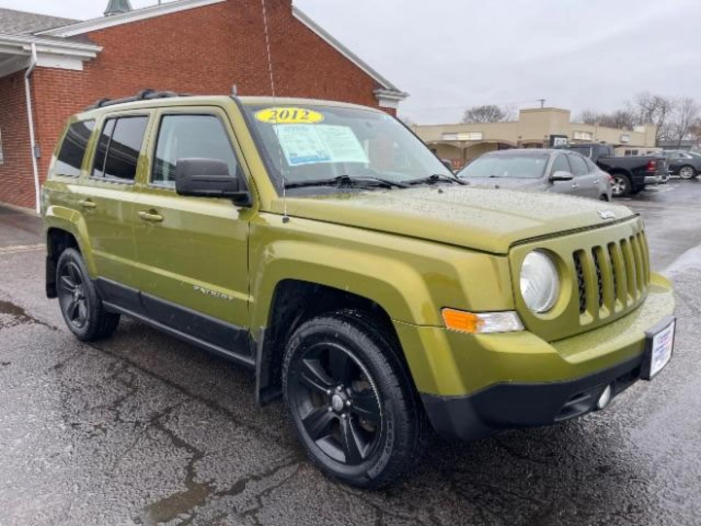 2012 Rescue Green Metallic Jeep Patriot Latitude 4WD (1C4NJRFB8CD) with an 2.4L L4 DOHC 16V engine, located at 1951 S Dayton Lakeview Rd., New Carlisle, OH, 45344, (937) 908-9800, 39.890999, -84.050255 - Photo#0