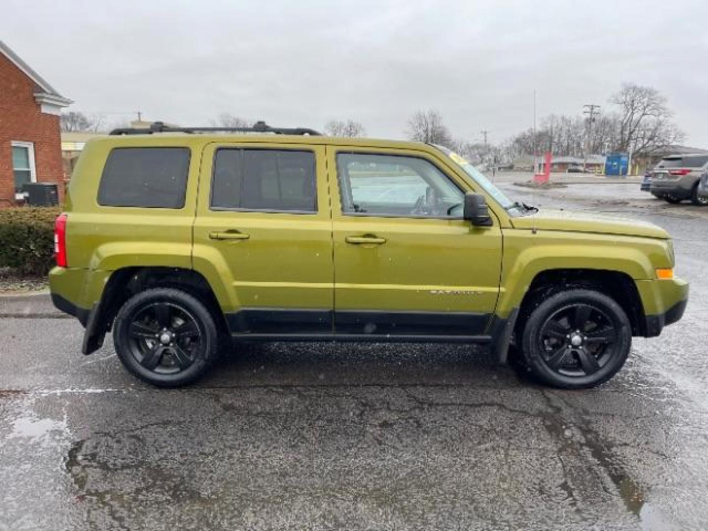 2012 Rescue Green Metallic Jeep Patriot Latitude 4WD (1C4NJRFB8CD) with an 2.4L L4 DOHC 16V engine, located at 1951 S Dayton Lakeview Rd., New Carlisle, OH, 45344, (937) 908-9800, 39.890999, -84.050255 - Photo#3