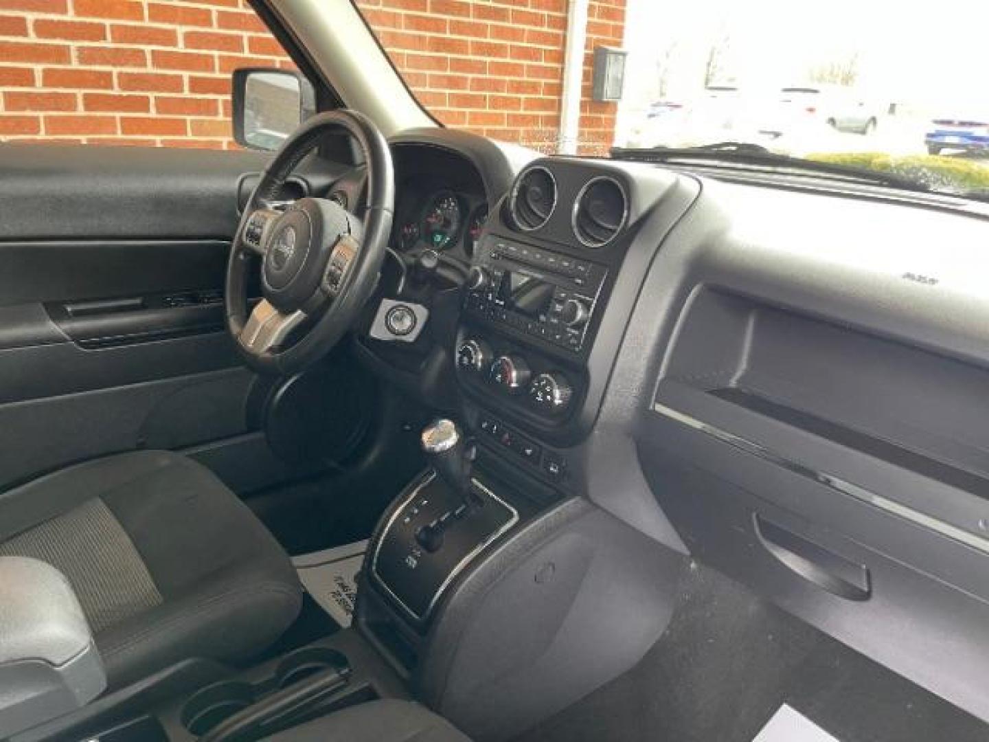 2012 Rescue Green Metallic Jeep Patriot Latitude 4WD (1C4NJRFB8CD) with an 2.4L L4 DOHC 16V engine, located at 1951 S Dayton Lakeview Rd., New Carlisle, OH, 45344, (937) 908-9800, 39.890999, -84.050255 - Photo#6