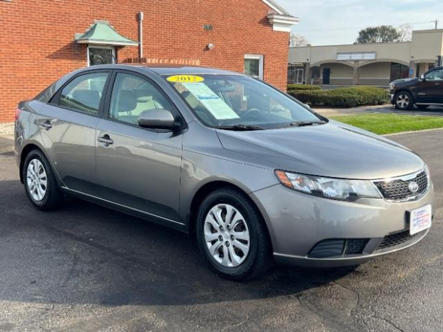 2012 Metal Bronze Metallic Kia Forte EX (KNAFU4A24C5) with an 2.0L L4 DOHC 16V engine, located at 1099 N County Rd 25A , Troy, OH, 45373, (937) 908-9800, 40.057079, -84.212883 - Photo#0