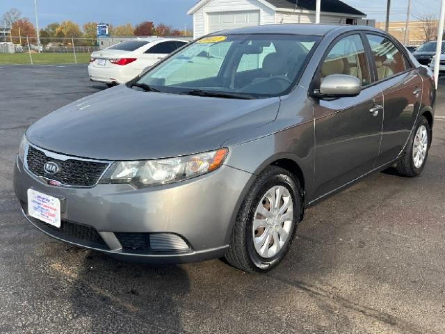 2012 Metal Bronze Metallic Kia Forte EX (KNAFU4A24C5) with an 2.0L L4 DOHC 16V engine, located at 1099 N County Rd 25A , Troy, OH, 45373, (937) 908-9800, 40.057079, -84.212883 - Photo#10