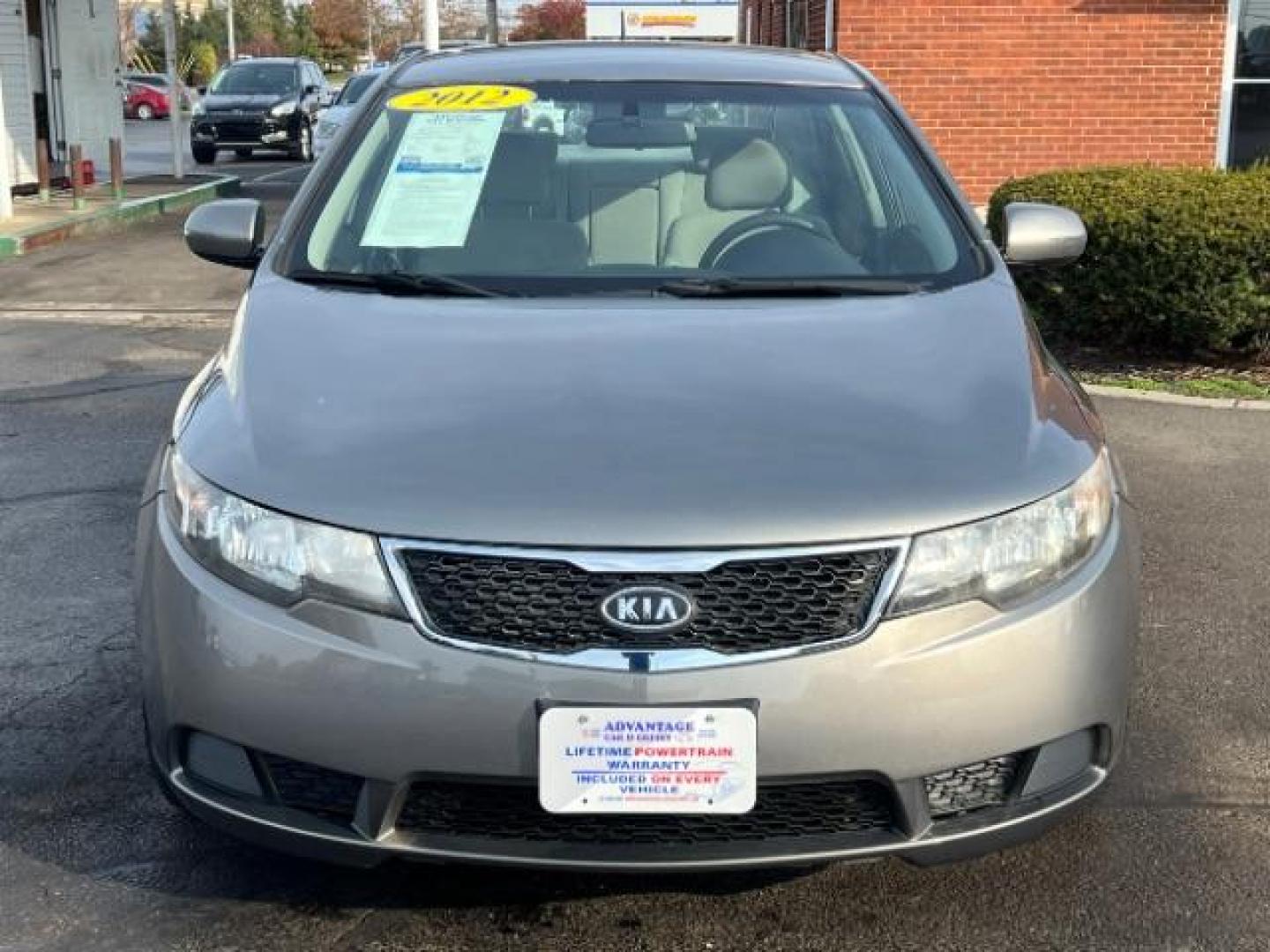 2012 Metal Bronze Metallic Kia Forte EX (KNAFU4A24C5) with an 2.0L L4 DOHC 16V engine, located at 1099 N County Rd 25A , Troy, OH, 45373, (937) 908-9800, 40.057079, -84.212883 - Photo#1