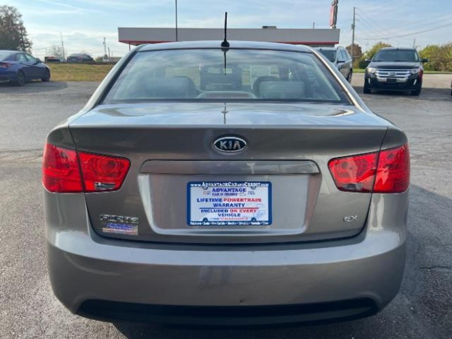 2012 Metal Bronze Metallic Kia Forte EX (KNAFU4A24C5) with an 2.0L L4 DOHC 16V engine, located at 1099 N County Rd 25A , Troy, OH, 45373, (937) 908-9800, 40.057079, -84.212883 - Photo#3