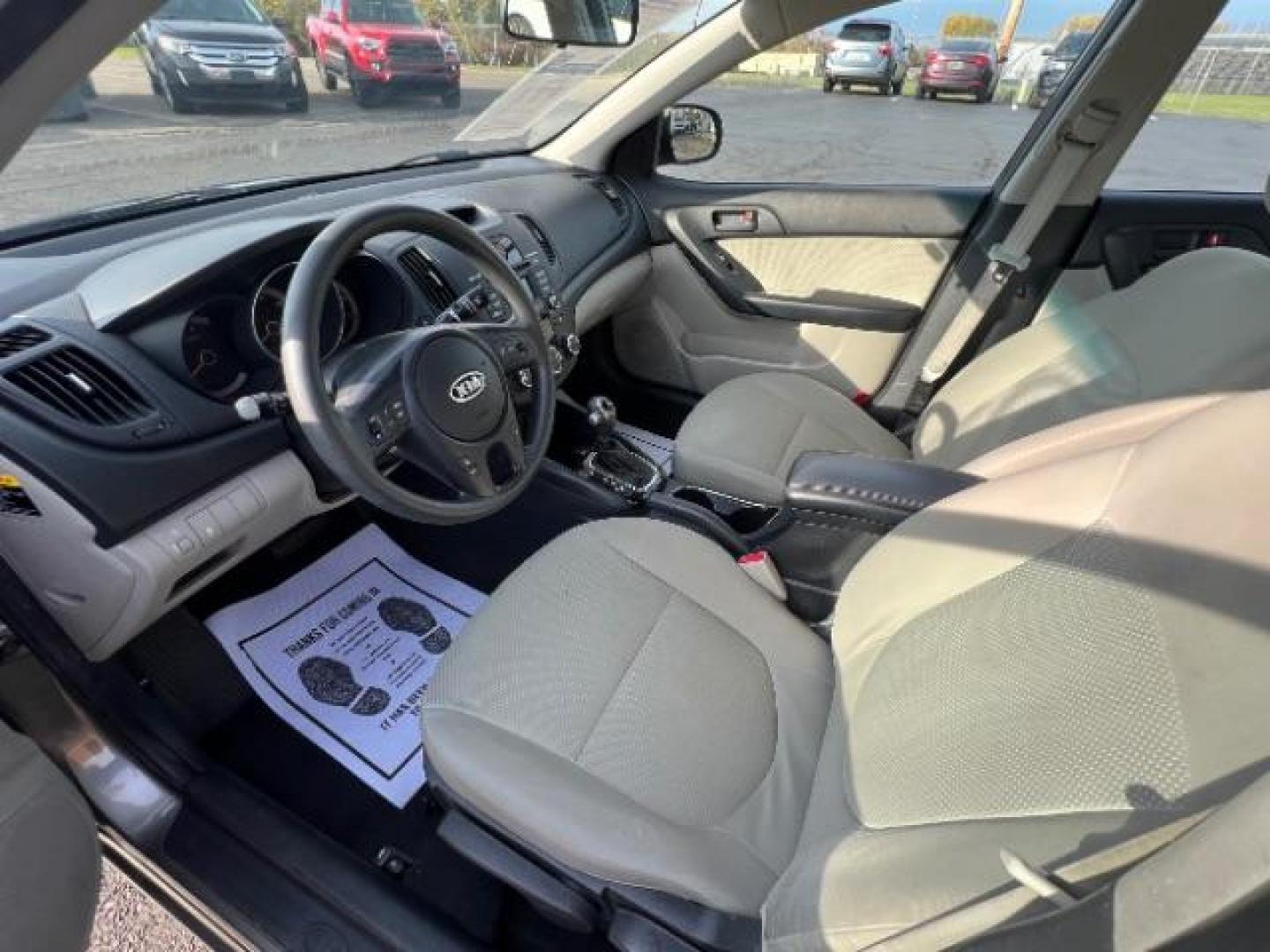 2012 Metal Bronze Metallic Kia Forte EX (KNAFU4A24C5) with an 2.0L L4 DOHC 16V engine, located at 1099 N County Rd 25A , Troy, OH, 45373, (937) 908-9800, 40.057079, -84.212883 - Photo#5