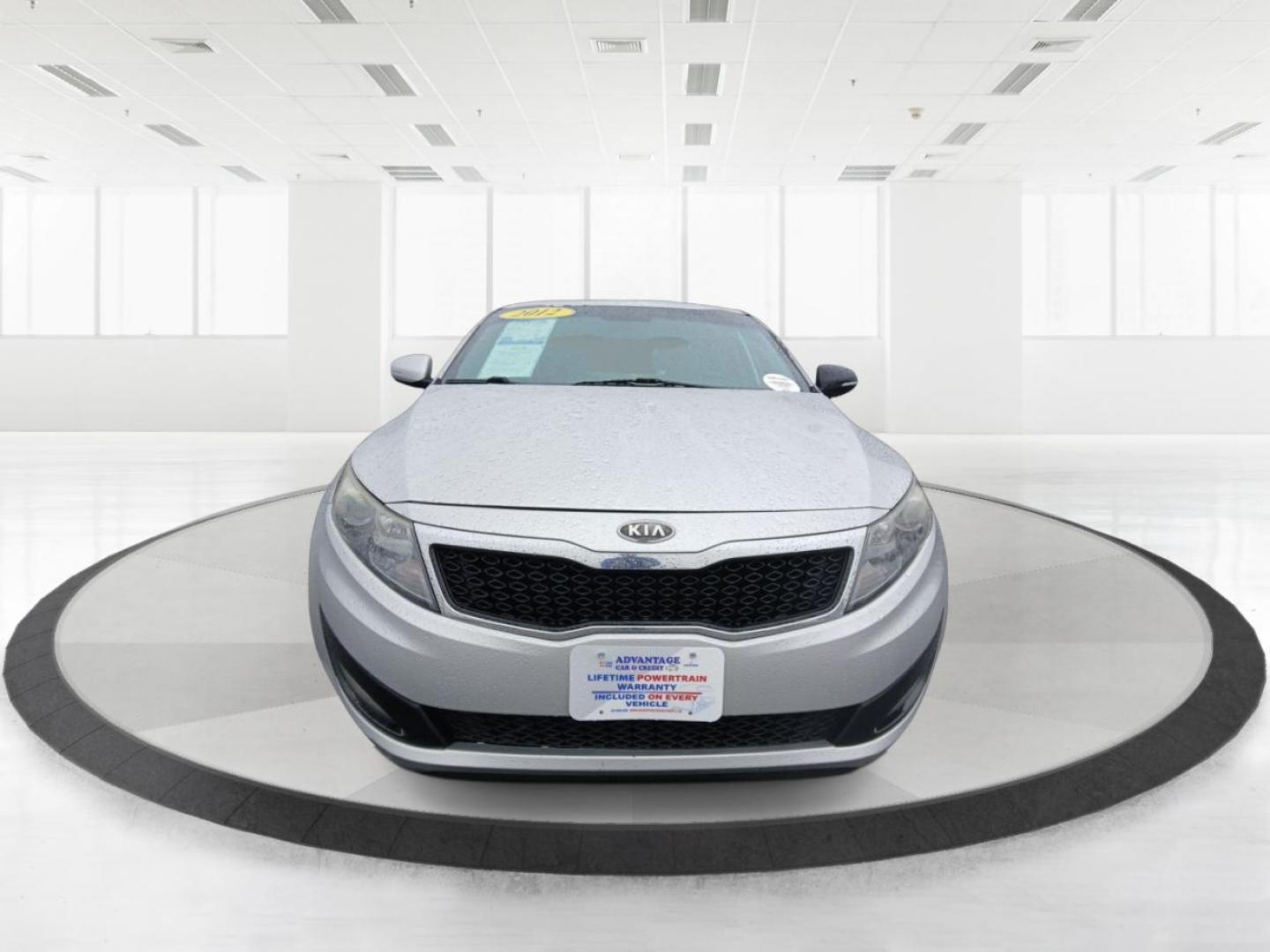 2012 Kia Optima EX (5XXGN4A7XCG) with an 2.4L L4 DOHC 16V engine, 6-Speed Automatic transmission, located at 401 Woodman Dr, Riverside, OH, 45431, (937) 908-9800, 39.760899, -84.123421 - 2012 Kia Optima EX - Photo#6