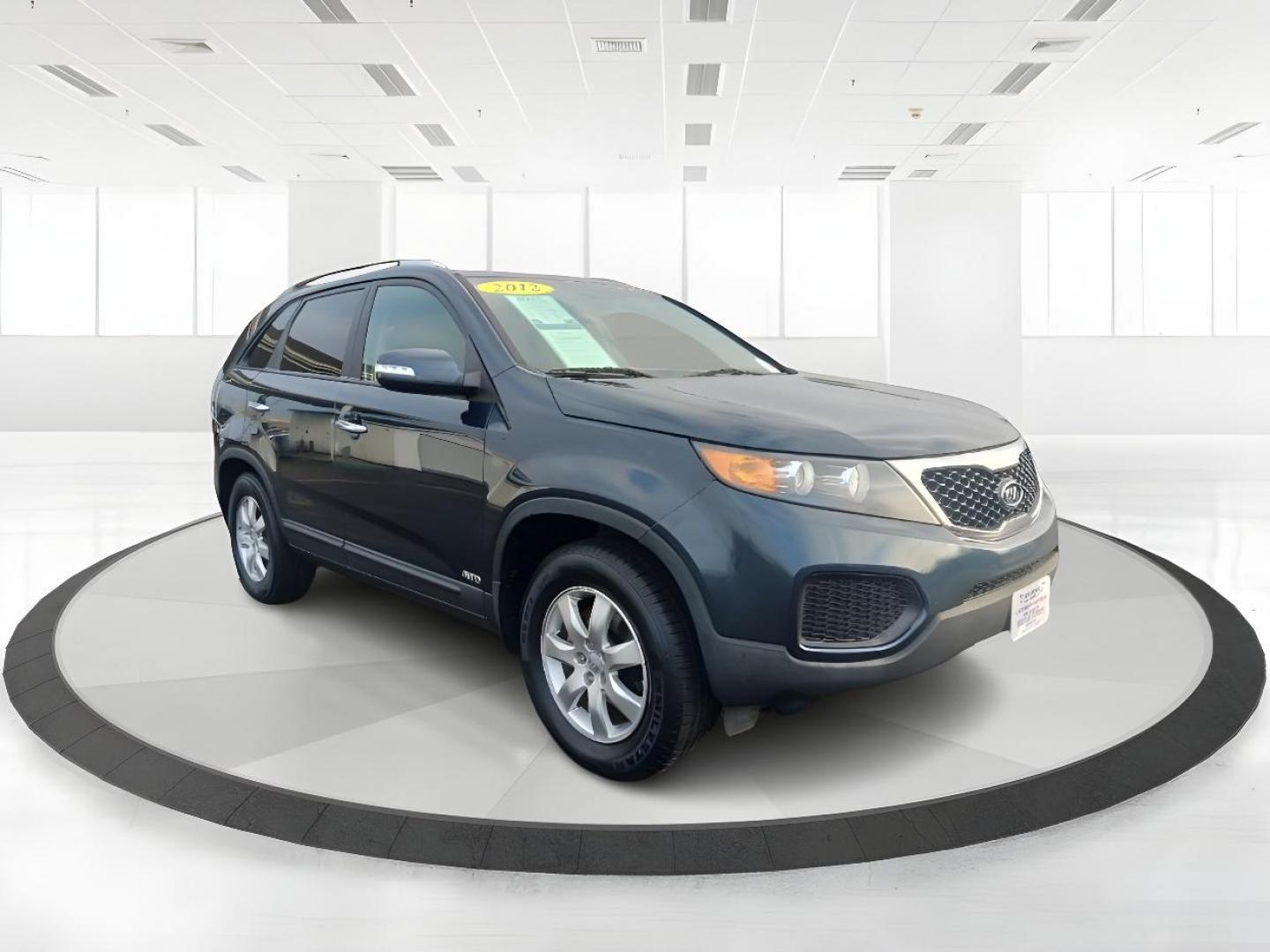 2012 Pacific Blue Kia Sorento LX 4WD (5XYKTDA2XCG) with an 3.5L V6 DOHC 24V engine, 6-Speed Automatic transmission, located at 1184 Kauffman Ave, Fairborn, OH, 45324, (937) 908-9800, 39.807072, -84.030914 - Photo#0