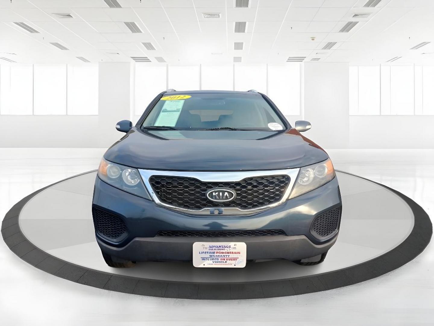 2012 Pacific Blue Kia Sorento (5XYKTDA2XCG) with an 3.5L V6 DOHC 24V engine, 6-Speed Automatic transmission, located at 1184 Kauffman Ave, Fairborn, OH, 45324, (937) 908-9800, 39.807072, -84.030914 - Photo#4