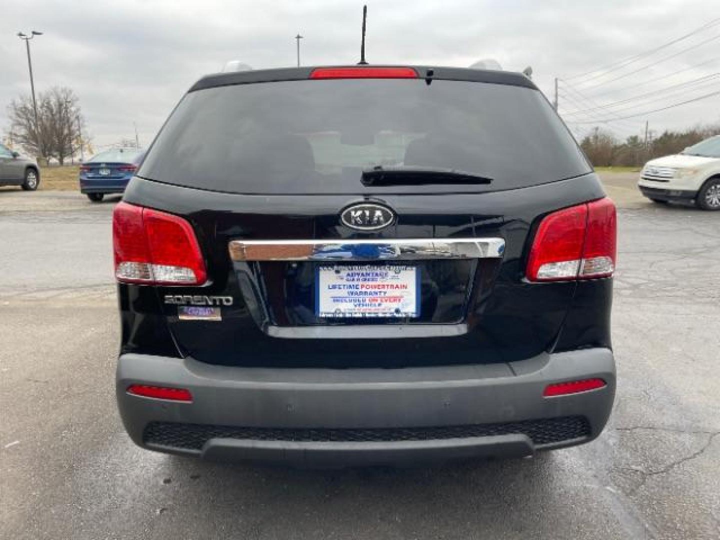 2012 Ebony Black Kia Sorento LX 4WD (5XYKTCA62CG) with an 2.4L L4 DOHC 16V engine, 6-Speed Automatic transmission, located at 880 E. National Road, Vandalia, OH, 45377, (937) 908-9800, 39.891918, -84.183594 - Photo#4