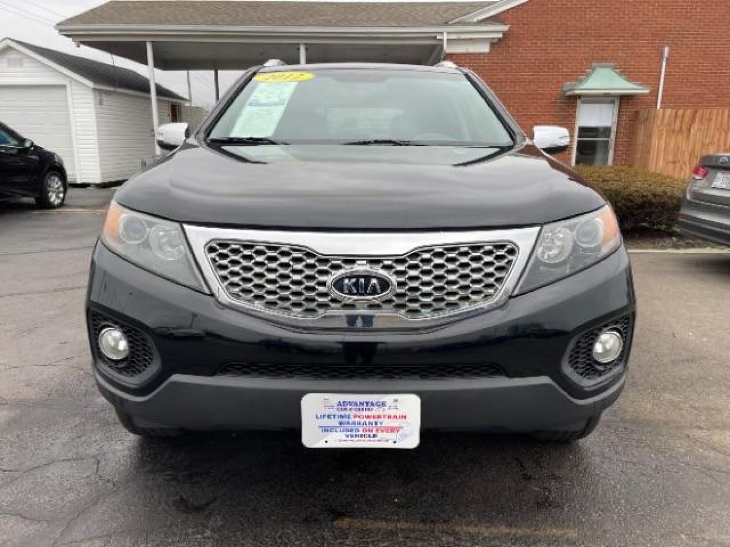 2012 Ebony Black Kia Sorento LX 4WD (5XYKTCA62CG) with an 2.4L L4 DOHC 16V engine, 6-Speed Automatic transmission, located at 880 E. National Road, Vandalia, OH, 45377, (937) 908-9800, 39.891918, -84.183594 - Photo#5