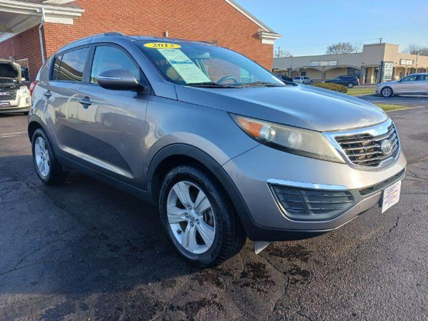 2012 Bright Silver Kia Sportage (KNDPB3A25C7) with an 2.4L V6 DOHC 24V engine, 6-Speed Automatic transmission, located at 4508 South Dixie Dr, Moraine, OH, 45439, (937) 908-9800, 39.689976, -84.218452 - Photo#0