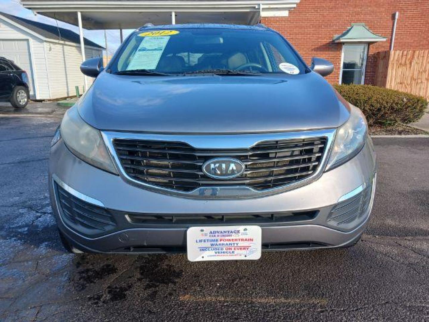 2012 Bright Silver Kia Sportage (KNDPB3A25C7) with an 2.4L V6 DOHC 24V engine, 6-Speed Automatic transmission, located at 4508 South Dixie Dr, Moraine, OH, 45439, (937) 908-9800, 39.689976, -84.218452 - Photo#1