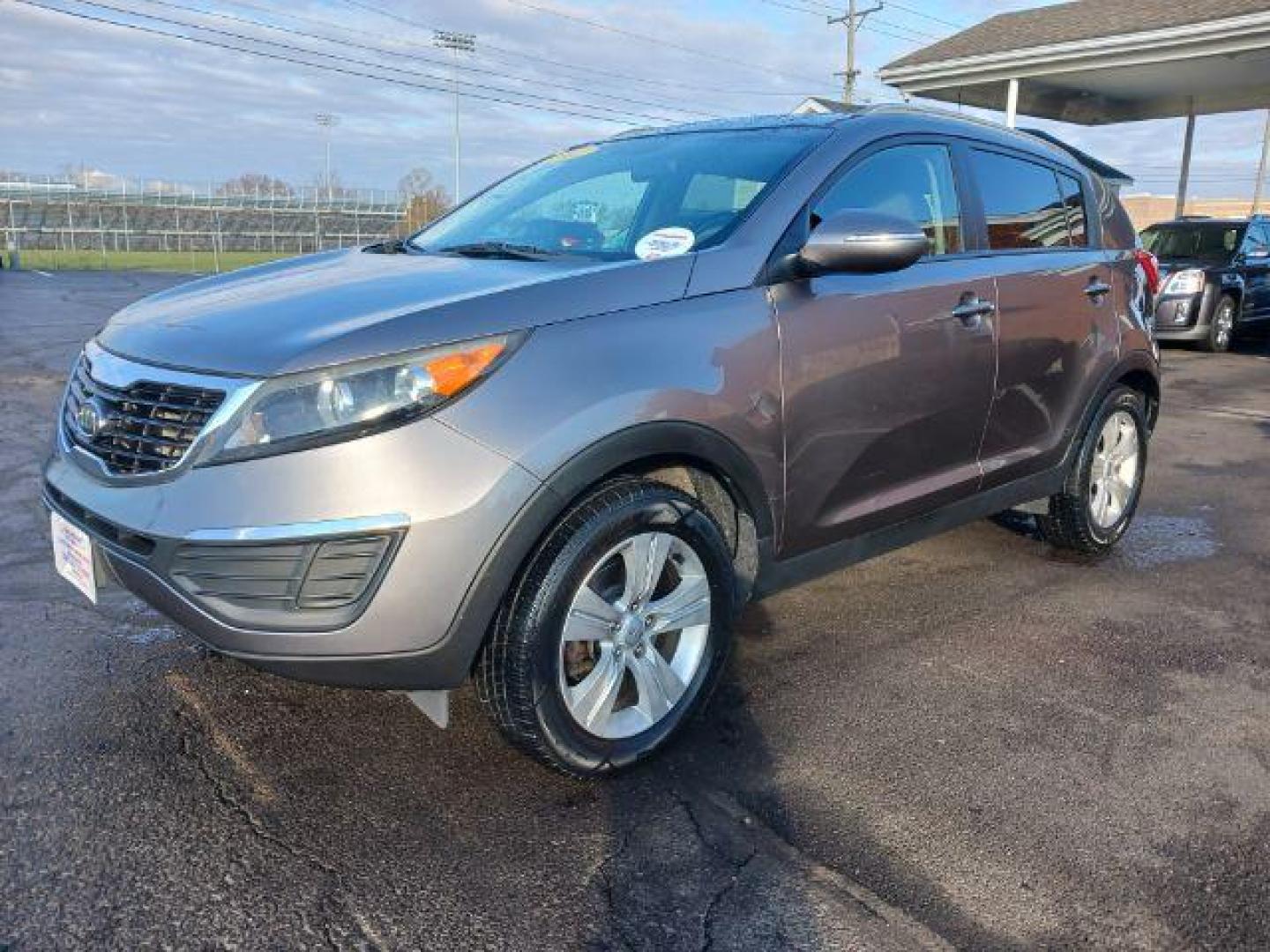 2012 Bright Silver Kia Sportage (KNDPB3A25C7) with an 2.4L V6 DOHC 24V engine, 6-Speed Automatic transmission, located at 4508 South Dixie Dr, Moraine, OH, 45439, (937) 908-9800, 39.689976, -84.218452 - Photo#2