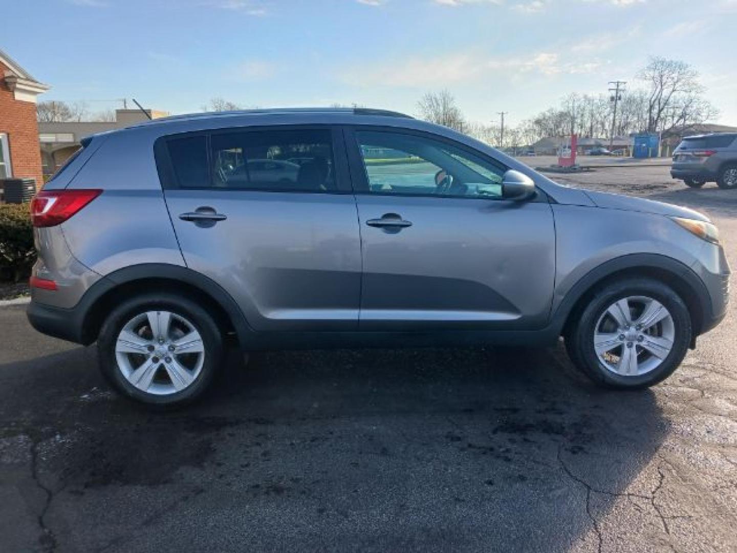 2012 Bright Silver Kia Sportage LX FWD (KNDPB3A25C7) with an 2.4L V6 DOHC 24V engine, 6-Speed Automatic transmission, located at 4508 South Dixie Dr, Moraine, OH, 45439, (937) 908-9800, 39.689976, -84.218452 - Photo#13