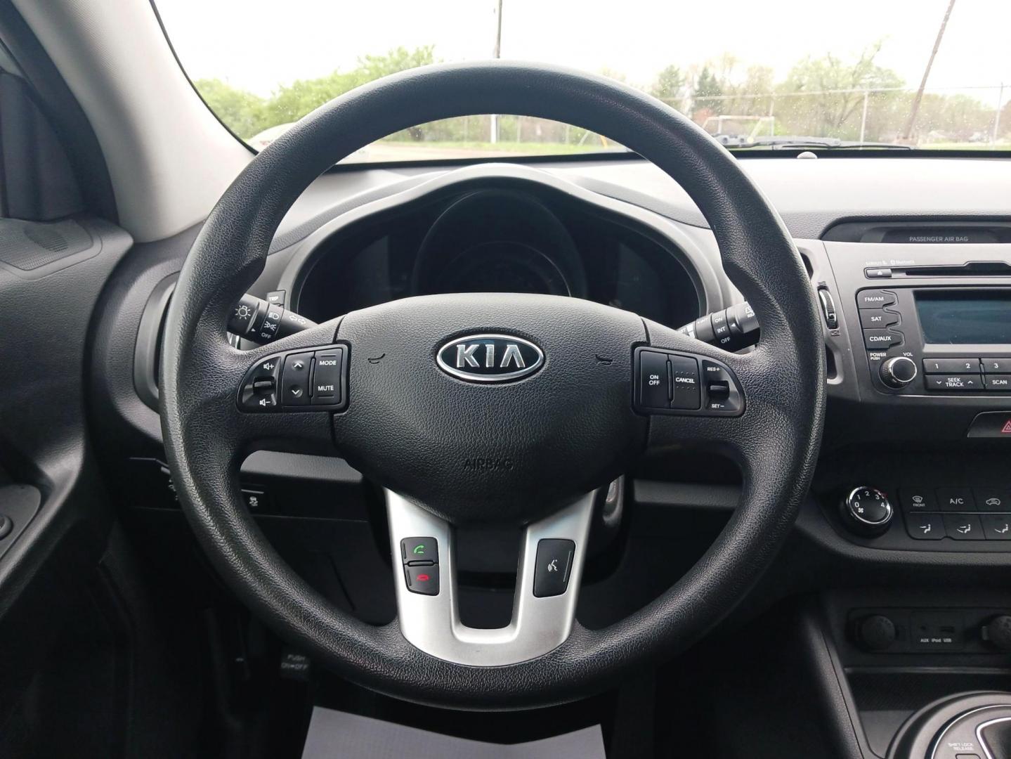 2012 Bright Silver Kia Sportage LX AWD (KNDPBCA29C7) with an 2.4L V6 DOHC 24V engine, 6-Speed Automatic transmission, located at 1099 N County Rd 25A , Troy, OH, 45373, (937) 908-9800, 40.057079, -84.212883 - Photo#15