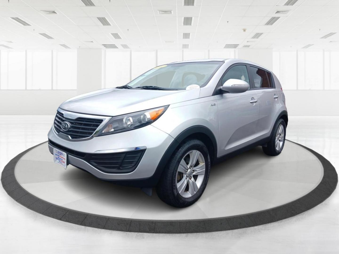 2012 Bright Silver Kia Sportage LX AWD (KNDPBCA29C7) with an 2.4L V6 DOHC 24V engine, 6-Speed Automatic transmission, located at 1099 N County Rd 25A , Troy, OH, 45373, (937) 908-9800, 40.057079, -84.212883 - Photo#7