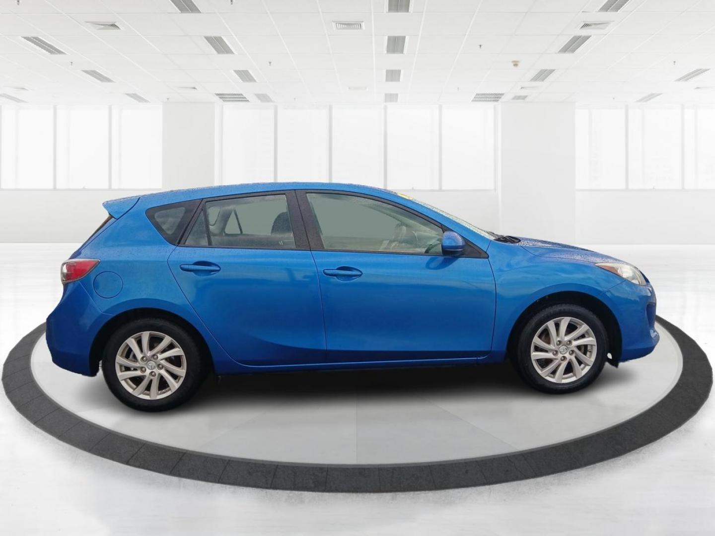 2012 Sky Blue Mica Mazda MAZDA3 I Grand Touring 5-Door (JM1BL1M72C1) with an 2.0L L4 DOHC 16V engine, located at 401 Woodman Dr, Riverside, OH, 45431, (937) 908-9800, 39.760899, -84.123421 - Photo#1