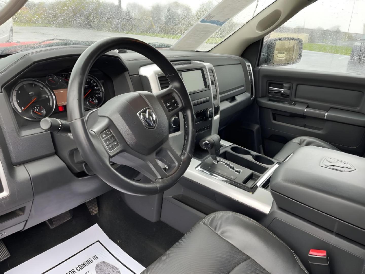 2012 Flame Red RAM 1500 (1C6RD7MT9CS) with an 5.7L V8 OHV 16V engine, 6-Speed Automatic transmission, located at 1099 N County Rd 25A , Troy, OH, 45373, (937) 908-9800, 40.057079, -84.212883 - Photo#6