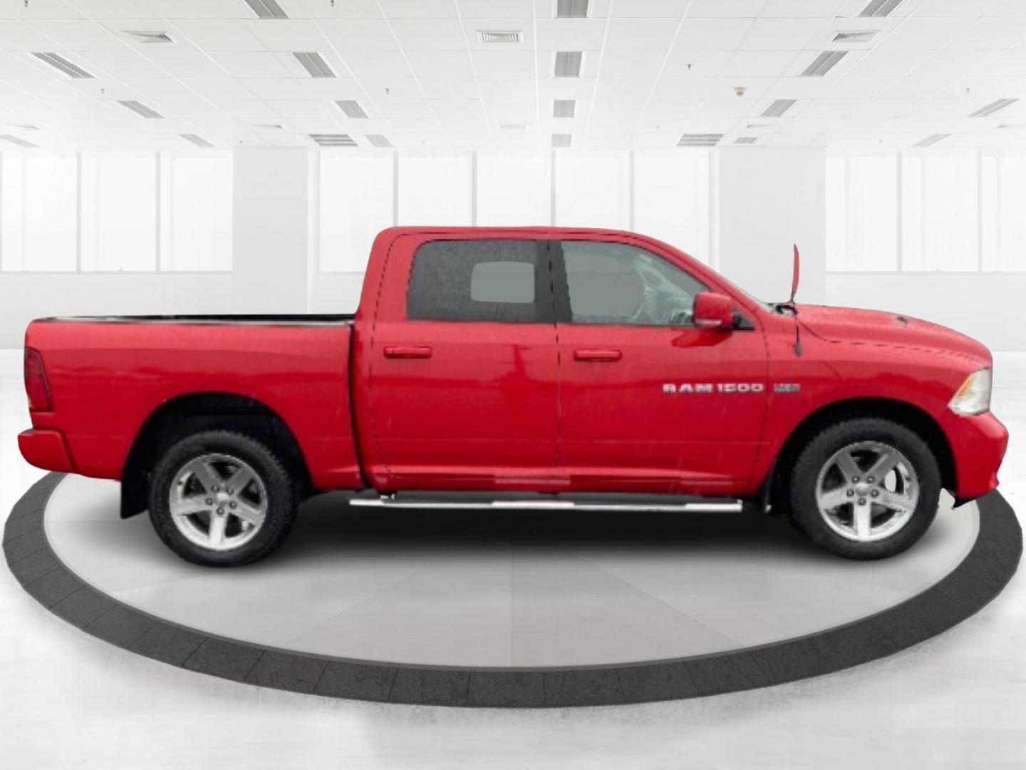 2012 Flame Red RAM 1500 (1C6RD7MT9CS) with an 5.7L V8 OHV 16V engine, 6-Speed Automatic transmission, located at 1099 N County Rd 25A , Troy, OH, 45373, (937) 908-9800, 40.057079, -84.212883 - Photo#1