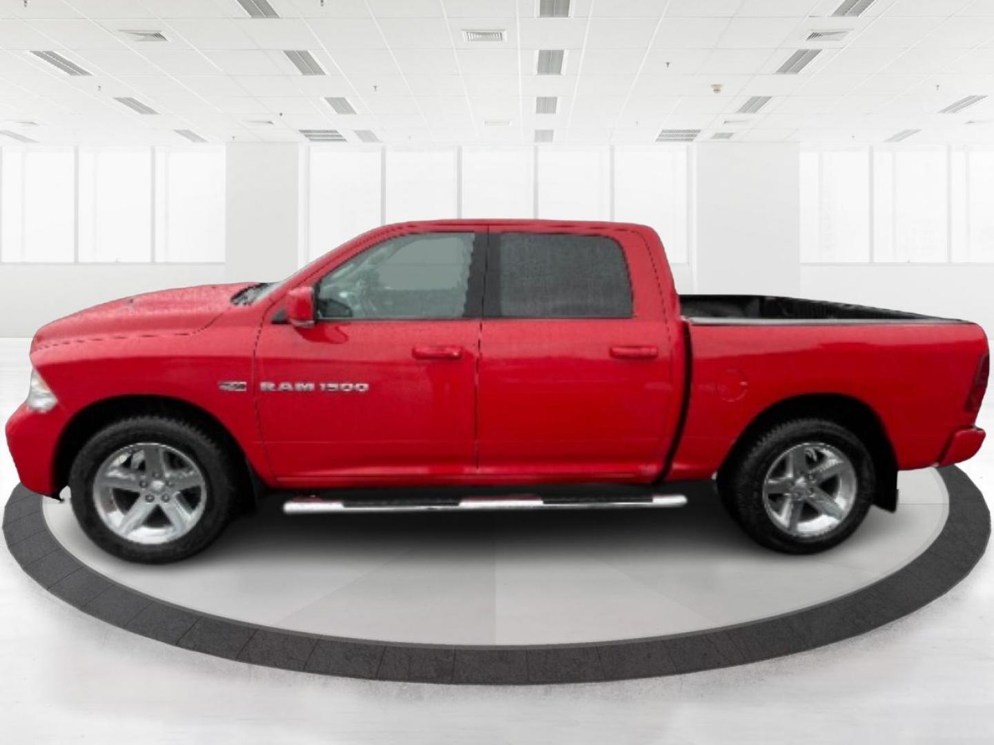 2012 Flame Red RAM 1500 (1C6RD7MT9CS) with an 5.7L V8 OHV 16V engine, 6-Speed Automatic transmission, located at 1099 N County Rd 25A , Troy, OH, 45373, (937) 908-9800, 40.057079, -84.212883 - Photo#3