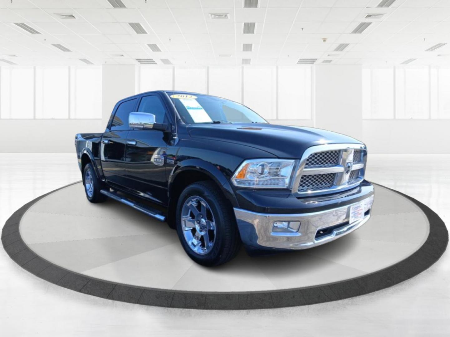 2012 Black Dodge Ram 1500 Laramie Longhorn Edition Crew Cab 4WD (1C6RD7PT6CS) with an 5.7L V8 OHV 16V engine, 6-Speed Automatic transmission, located at 401 Woodman Dr, Riverside, OH, 45431, (937) 908-9800, 39.760899, -84.123421 - Photo#0