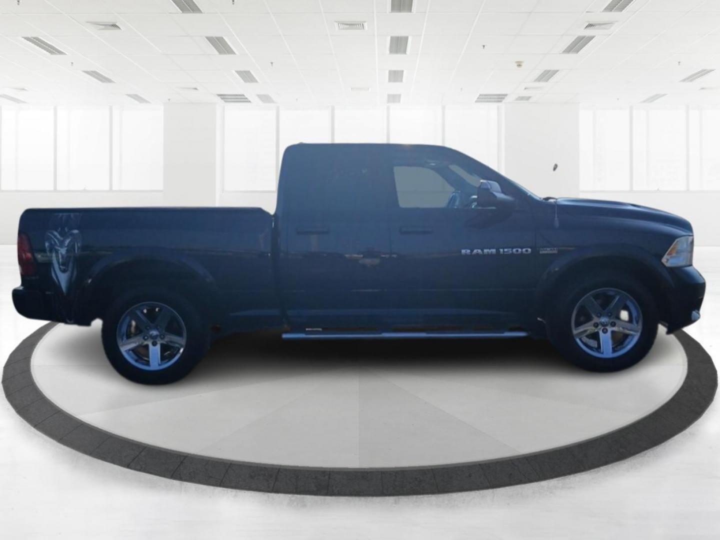 2012 True Blue Pearl RAM 1500 Sport Quad Cab 4WD (1C6RD7HT2CS) with an 5.7L V8 OHV 16V engine, 6-Speed Automatic transmission, located at 880 E. National Road, Vandalia, OH, 45377, (937) 908-9800, 39.891918, -84.183594 - Photo#1