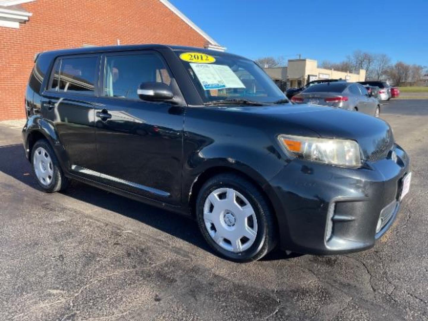 2012 Black Scion xB 5-Door Wagon 4-Spd AT (JTLZE4FE9CJ) with an 2.4L L4 DOHC 16V engine, 4-Speed Automatic transmission, located at 1099 N County Rd 25A , Troy, OH, 45373, (937) 908-9800, 40.057079, -84.212883 - Photo#0