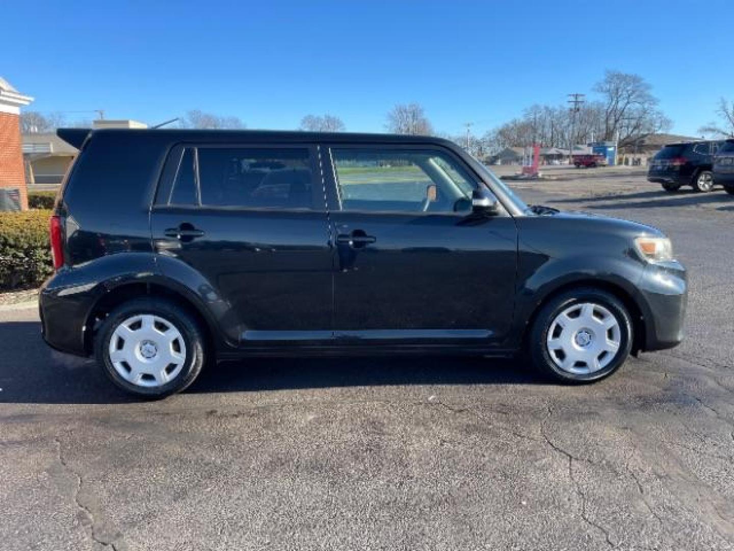 2012 Black Scion xB 5-Door Wagon 4-Spd AT (JTLZE4FE9CJ) with an 2.4L L4 DOHC 16V engine, 4-Speed Automatic transmission, located at 1099 N County Rd 25A , Troy, OH, 45373, (937) 908-9800, 40.057079, -84.212883 - Photo#5