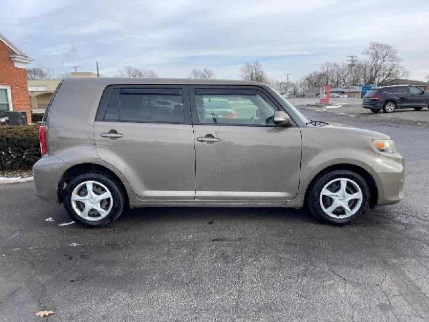 2012 Army Rock Metallic Scion xB 5-Door Wagon 4-Spd AT (JTLZE4FE5CJ) with an 2.4L L4 DOHC 16V engine, 4-Speed Automatic transmission, located at 401 Woodman Dr, Riverside, OH, 45431, (937) 908-9800, 39.760899, -84.123421 - Photo#3