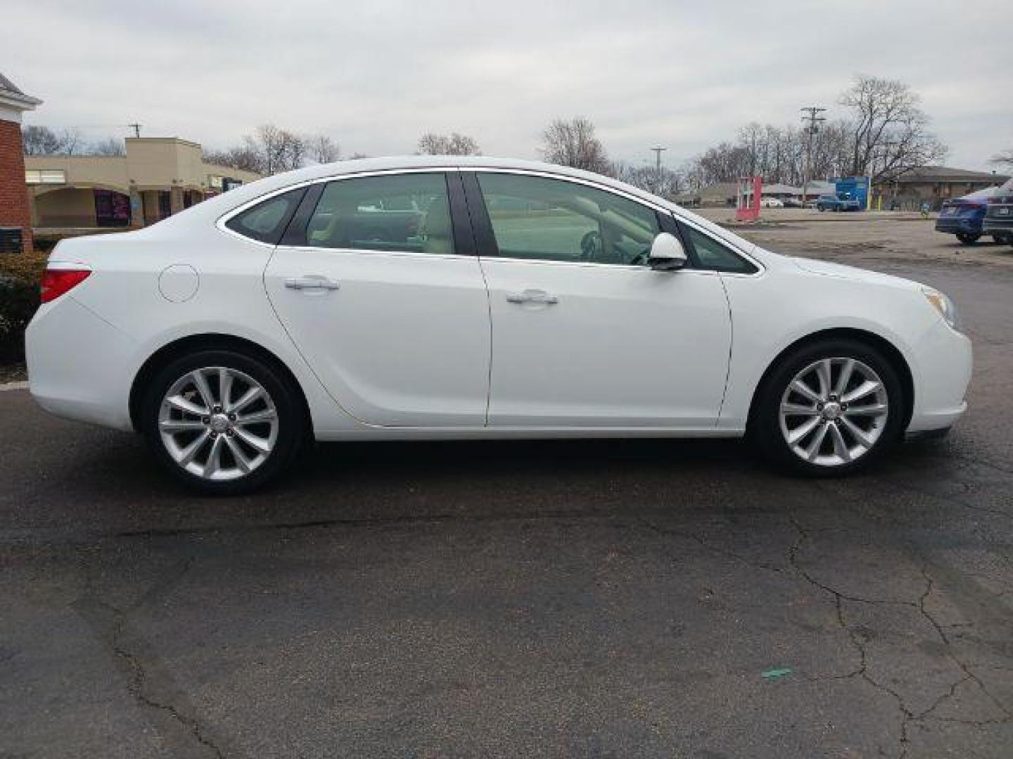 2013 Summit White Buick Verano Base (1G4PP5SKXD4) with an 2.4L L4 DOHC 16V FFV engine, 6-Speed Automatic transmission, located at 4508 South Dixie Dr, Moraine, OH, 45439, (937) 908-9800, 39.689976, -84.218452 - Photo#4