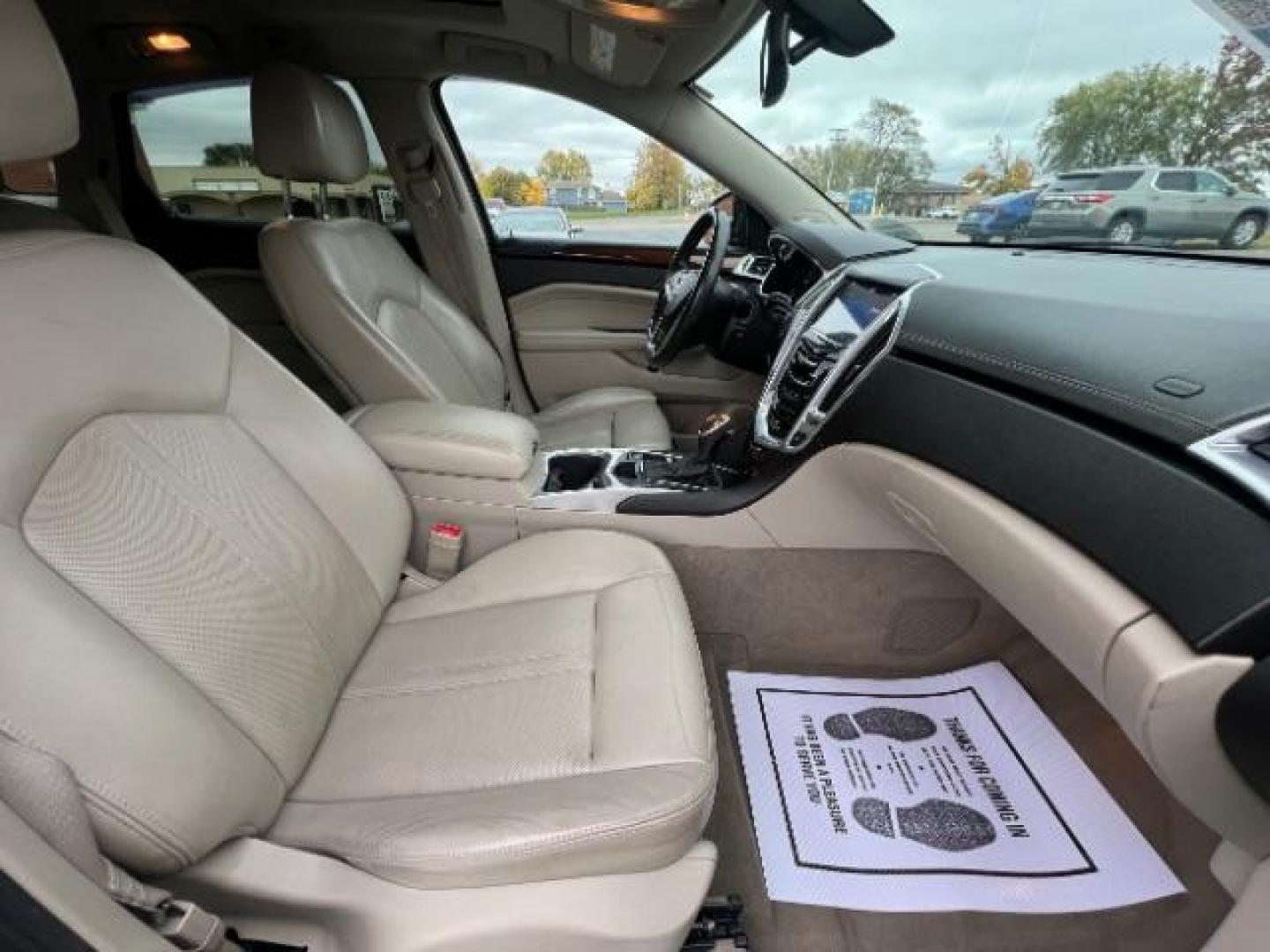 2013 Black Raven Cadillac SRX AWD Luxury Collection (3GYFNGE36DS) with an 3.6L V6 DOHC 24V FFV engine, 6-Speed Automatic transmission, located at 1099 N County Rd 25A , Troy, OH, 45373, (937) 908-9800, 40.057079, -84.212883 - Photo#9